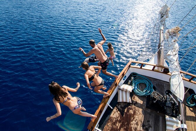 Santorini Sunset Dinner Cruise Including Nea Kameni Visit - Tour Highlights