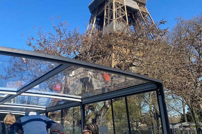 Eiffel Tower Elevator Visit With a Guide and City Bus Tour - Guide Services