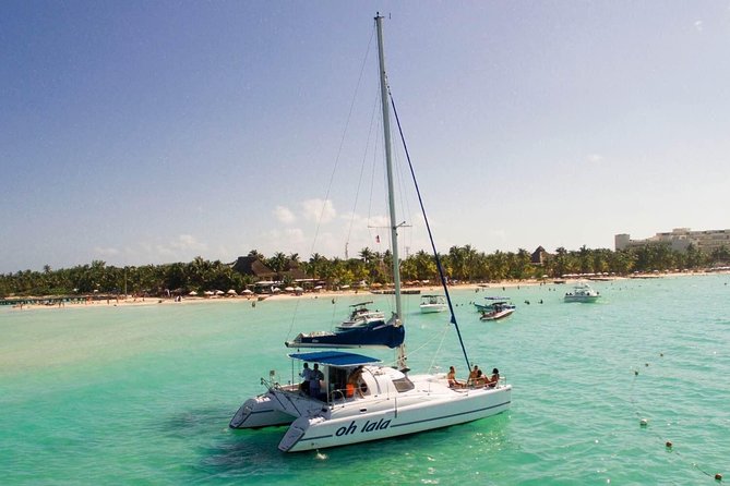 Private Isla Mujeres Catamaran Tour From Cancun With Open Bar - Pickup Information and Dress Code