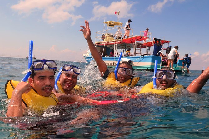 Cozumel Coral Reef Snorkeling by Glass Bottom Boat With Guide - Common questions