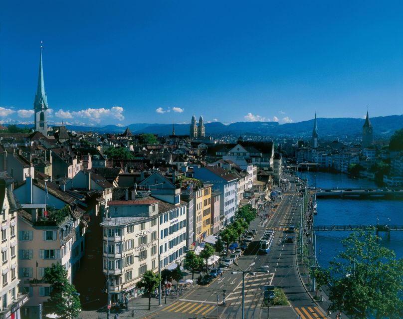 Zurich: City Bus Tour With Audio Guide and Lake Cruise - Key Points