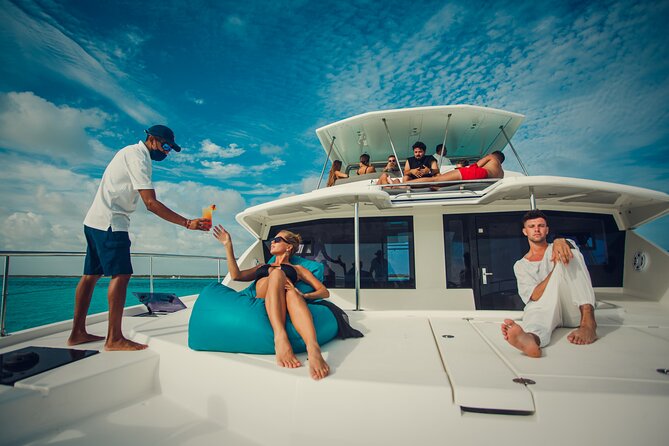 Half-Day Private Catamaran Charter From Puerto Aventuras  - Tulum - Booking Details and Pricing