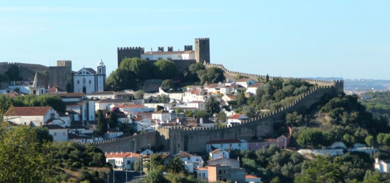 Lisbon to Porto Stop Óbidos, Nazaré, Fátima, Coimbra, Aveiro