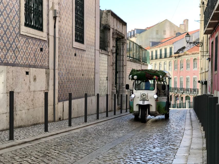 Lisbon: Famous 28 Tram Line Guided Private Tour by Tuk-Tuk - Activity Description