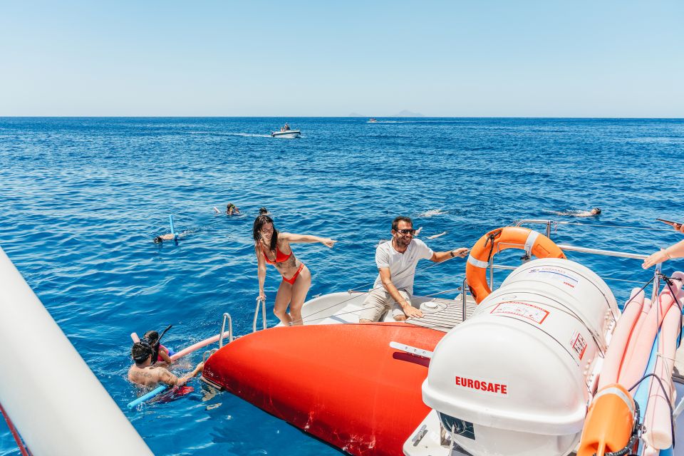 Santorini: Catamaran Tour With BBQ Dinner, Drinks, and Music - Pricing and Duration