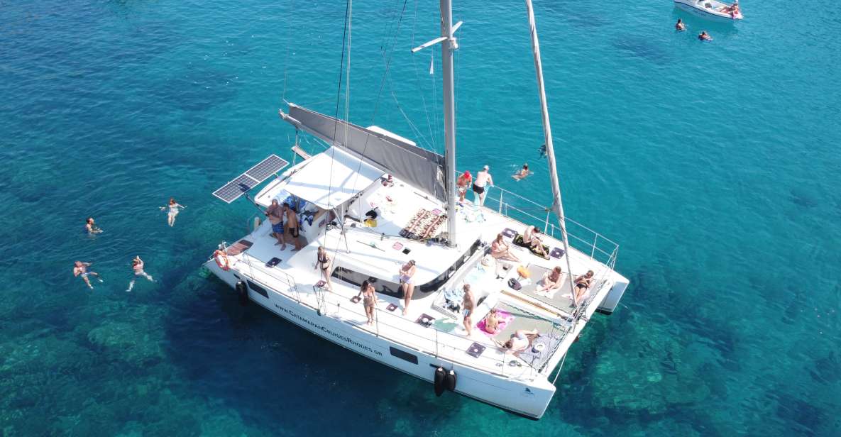 From Rhodes: Private Catamaran Cruise All Inclusive - Group Type and Itinerary Highlights
