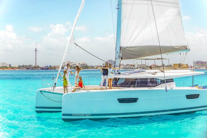 Catamaran to Isla Mujeres Snorkeling Tour With Open Bar and Lunch - Pickup and Drop-off