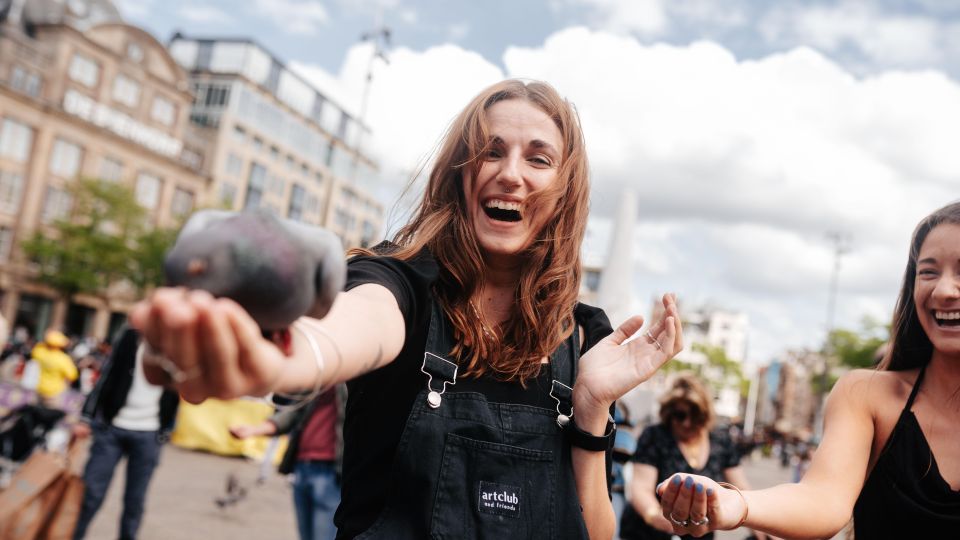 Amsterdam: Professional Photoshoot at Dam Square. - Meeting Point