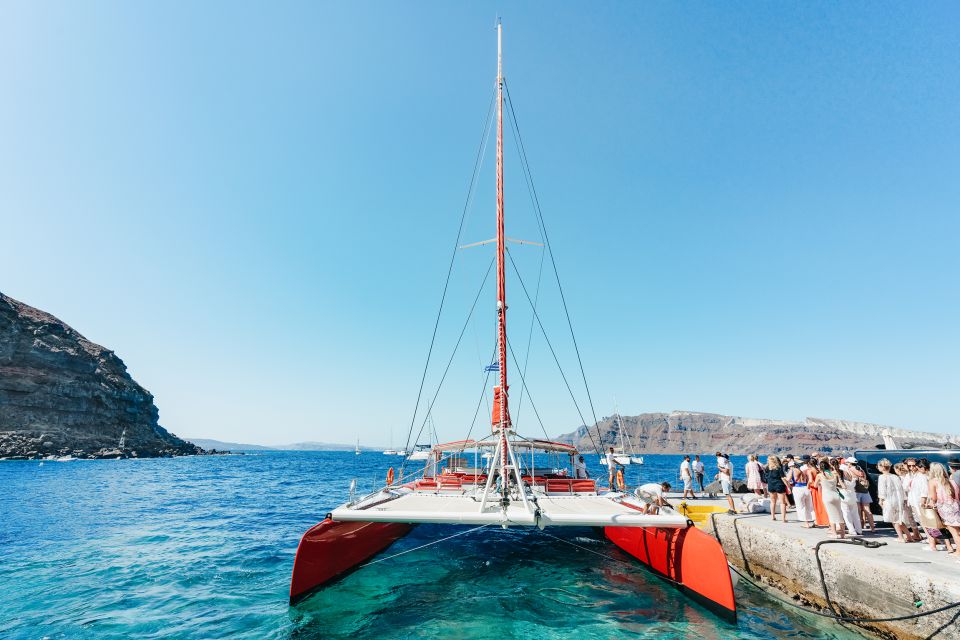 Santorini: Catamaran Tour With BBQ Dinner, Drinks, and Music - Key Points