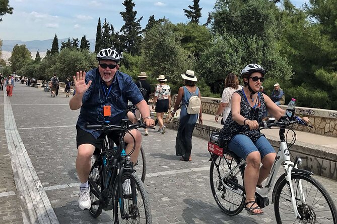 Shore Excursion to Athens Monuments With Street Food by Electric Bike - Local Guide and Landmarks