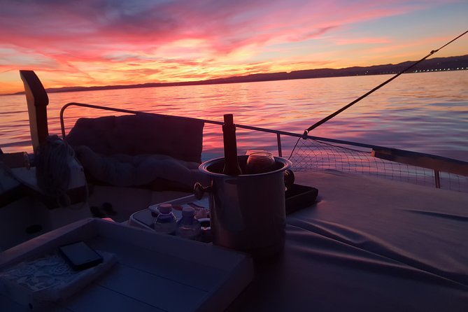 Boat Trip at Sunset + Bottle of Cava + Seafood Tapa - Experience Highlights