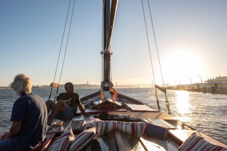 Lisbon: Private Sunset Tour Aboard a 1949 Traditional Boat