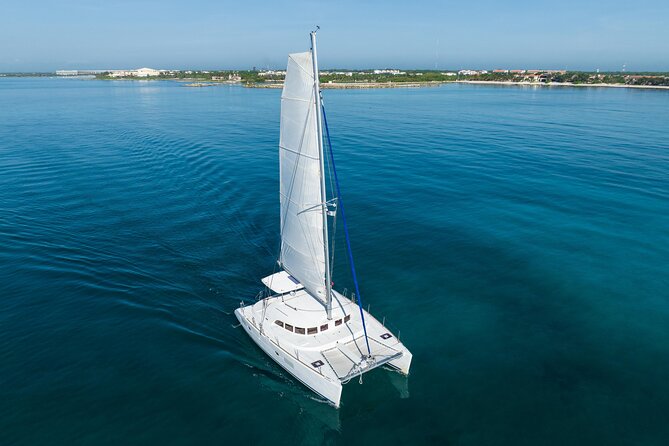 8-Hour Private 38 Catamaran 2-Stop Tour to Cozumel With Food,Open Bar & Snorkel - Inclusions and Activities