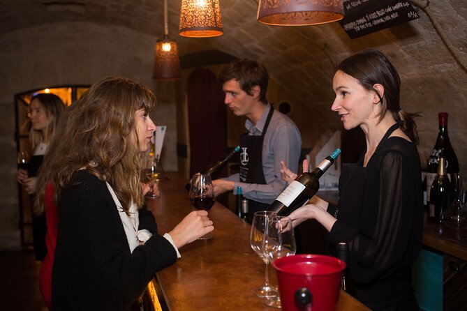 Audio Guided Tour and Wine Tasting at Caves Du Louvre - Cancellation Policy