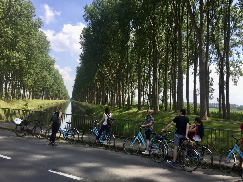 Bruges: Flatlands Guided Bike Tour - Sightseeing Highlights
