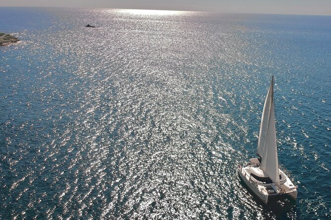 Infinity Blue Semi Private Sunset Cruise With Meal in Santorini - Viators Semi-Private Cruise Setting