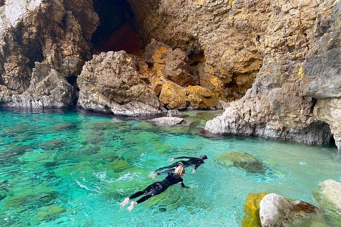 Kayak Paradise: Cala Portixol Snorkel, Cave & Cliff Jumping Tour - Safety Precautions