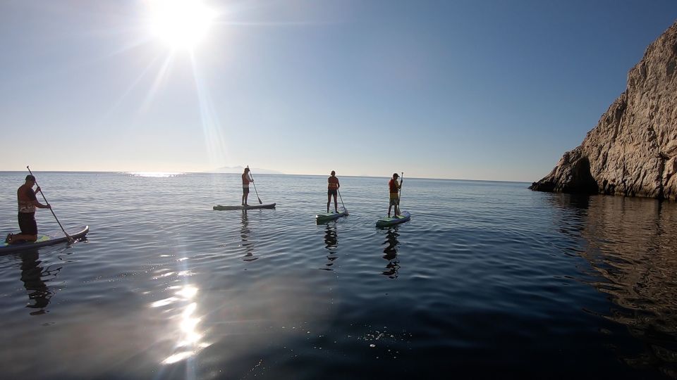 Santorini: Stand-Up Paddle and Snorkel Adventure - Language and Cancellation Policy