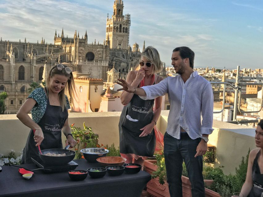 Seville: Highlights Rooftop Tour & Paella Cooking Class - Common questions