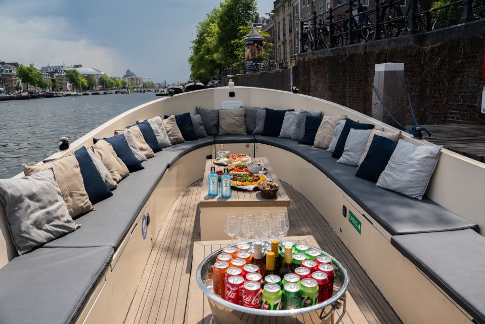 Amsterdam: Private Canal Booze Cruise With Unlimited Drinks - Key Points