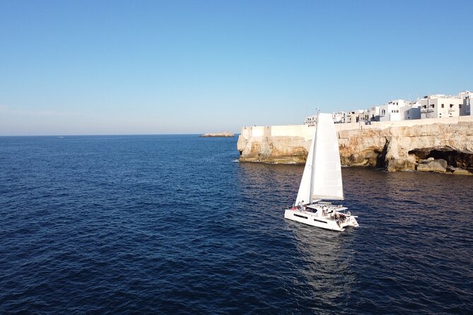 Guided Tour by Catamaran With Aperitif From Polignano a Mare - Key Points
