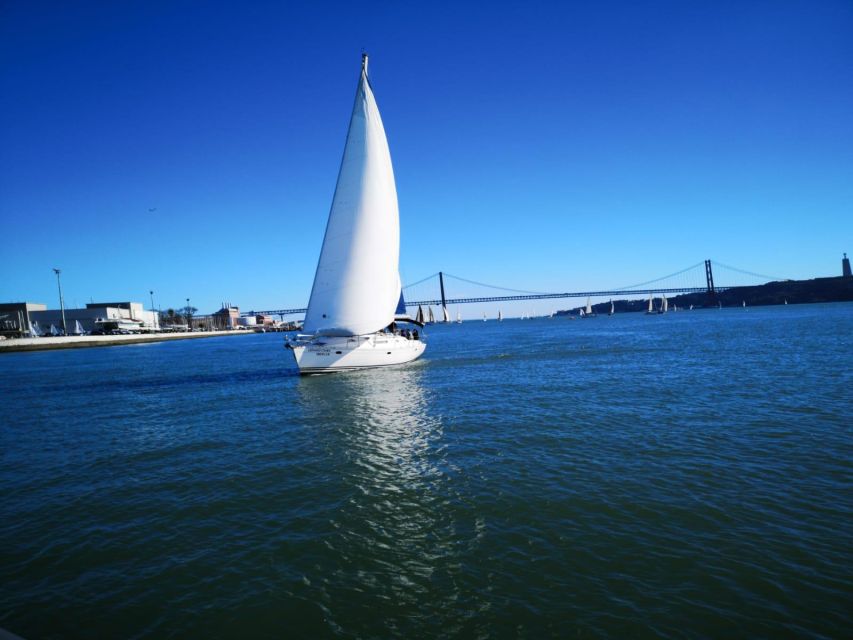 Lisbon: Yacht Sailing Tour With Portuguese Wine and History - Key Points