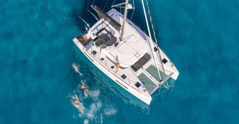 Mykonos: Rhenia Island Catamaran Cruise With Meal and Drinks