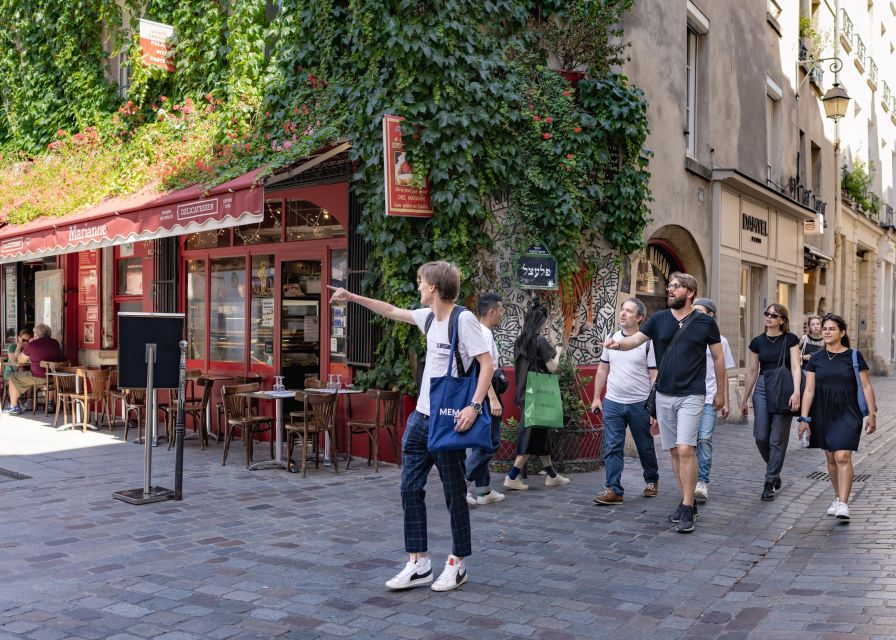 Paris: Iconic Neighborhoods Guided Walking Tour - Discovering Paris Hidden Gems