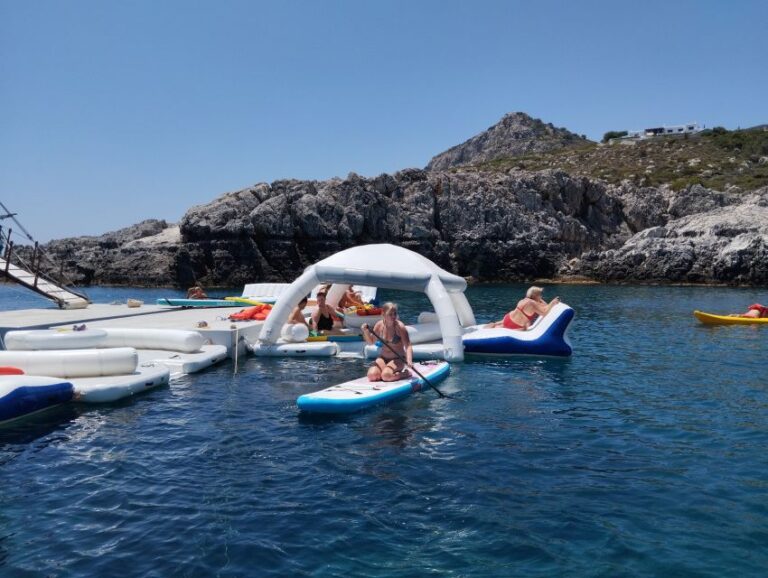 Rhodes: Boat Cruise With Food, Drinks, SUP, Kayak & Swimming