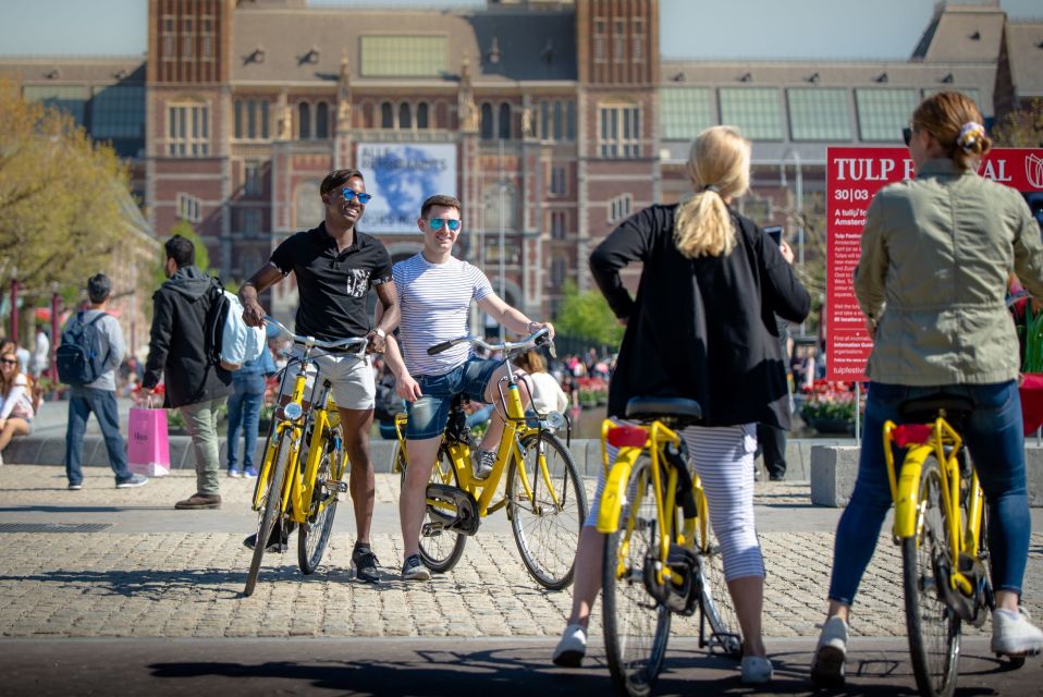 Amsterdam: 2-Hour City Highlights Guided Bike Tour - Included Amenities and Meeting Point