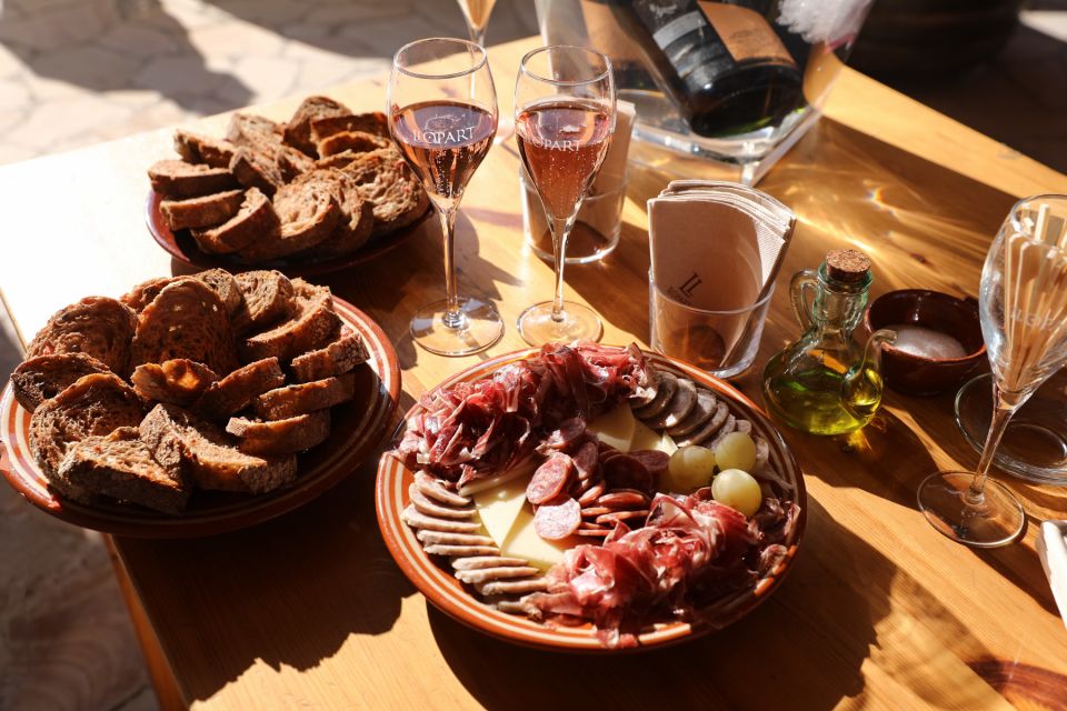 From Barcelona: Montserrat Lunch & Wine Tasting in Vineyard - Tour Highlights