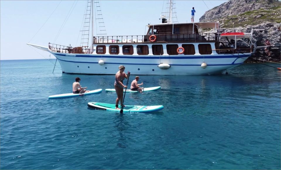 Rhodes: Boat Cruise With Food, Drinks, SUP, Kayak & Swimming - Unbeatable Savings Offered
