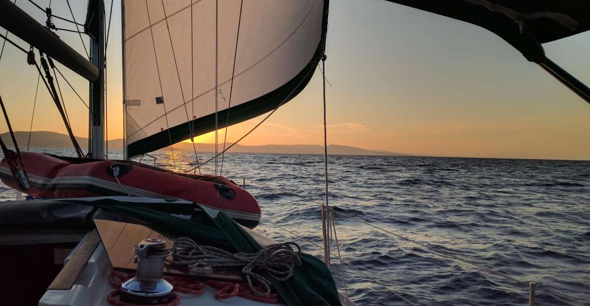 From Neos Marmaras: Sunset Sailing Tour to Coves & Islands - Language and Group Size