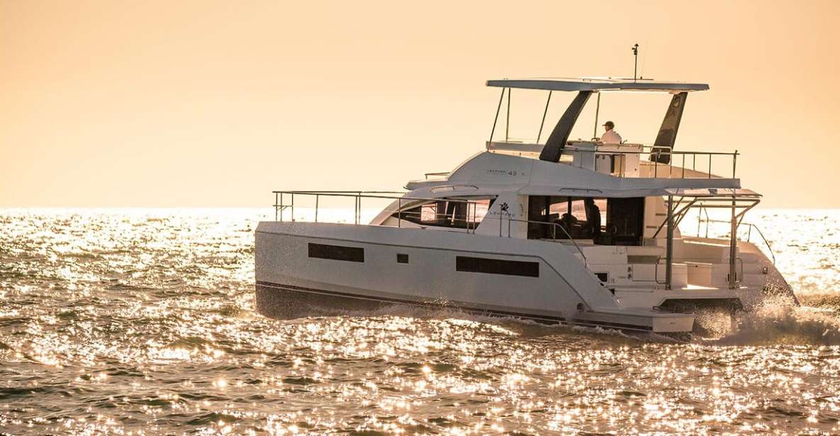 From Rhodes: Private Catamaran Sunset Cruise All Inclusive - Key Features