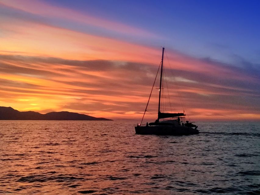 Hersonissos: Sunset Catamaran Trip With Finger Food & Drinks - Inclusions and Amenities