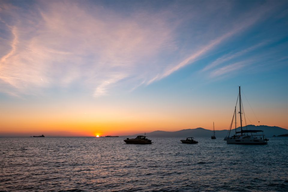 Mykonos: Sunset Cruise With a Buffet of Greek Delicacies - Highlights