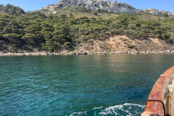 Boat Tour of the Devils Saddle With Swimming and Aperitif Stops - Devils Saddle Exploration