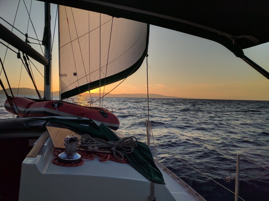 From Neos Marmaras: Sunset Sailing Tour to Coves & Islands - Experience Highlights