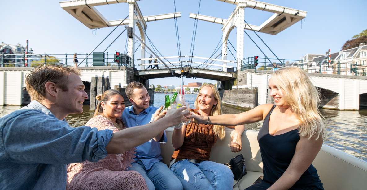 Amsterdam: Boat Cruise With Drinks and Nibbles - Amsterdam Canal Insights