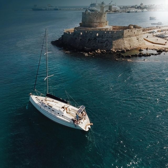 Rhodes Town: Sailing Cruise With Swim Stops, Meal and Drinks - Sunset Cruise Experience