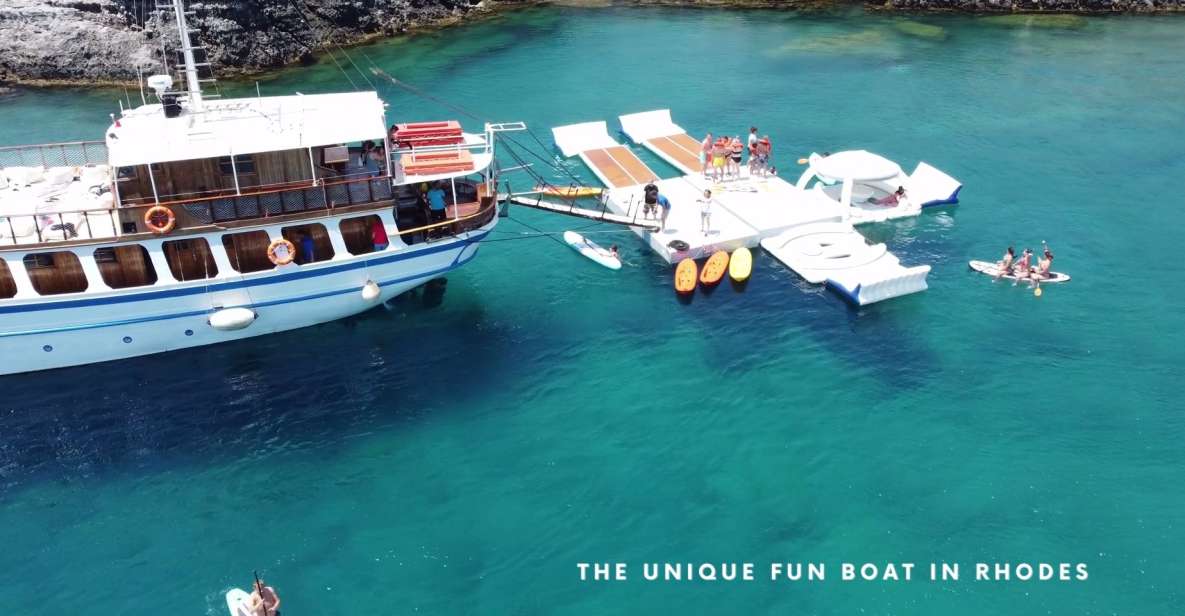 Rhodes: Boat Cruise With Food, Drinks, SUP, Kayak & Swimming - Scenic Highlights and Sightseeing