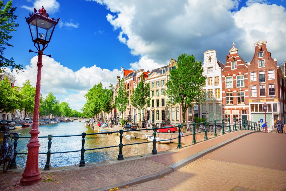 Amsterdam: City Exploration Game and Walking Tour - Key Points