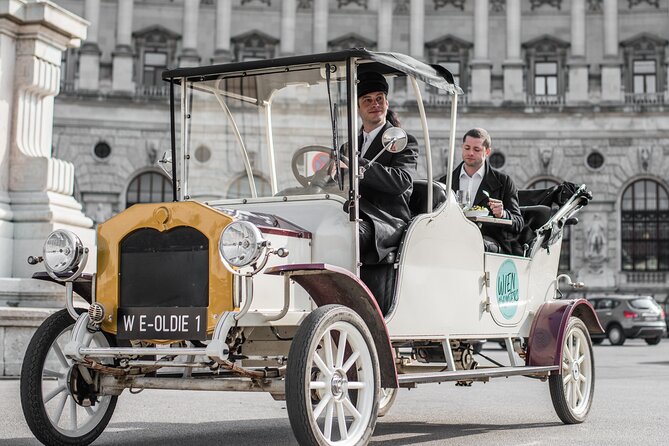 City Sightseeing Tour in an Electro Vintage Car (Up to 5 People)