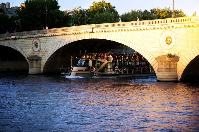 Paris Seine River Sightseeing Cruise With Commentary by Bateaux Parisiens - Departure Times and Attractions