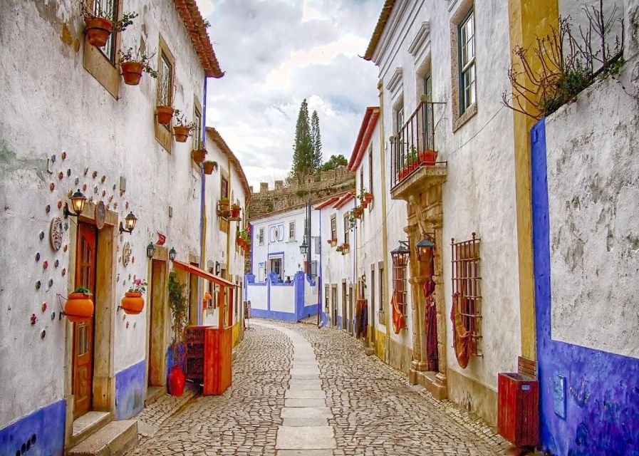 From Lisbon: Óbidos and Nazaré Private Half-Day Tour - Key Points