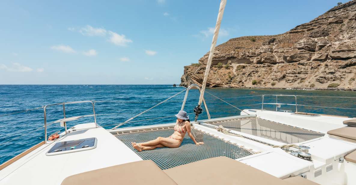Santorini: Luxury Catamaran Day Trip With Meal and Open Bar - Key Points