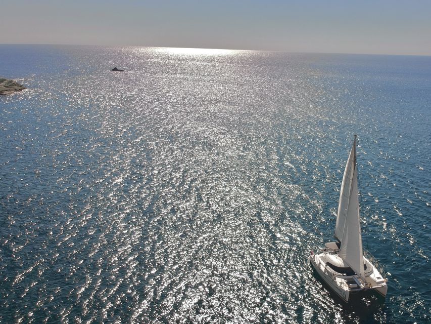 Santorini: Private Catamaran Excursion With Food and Drinks - Duration and Cancellation Policy