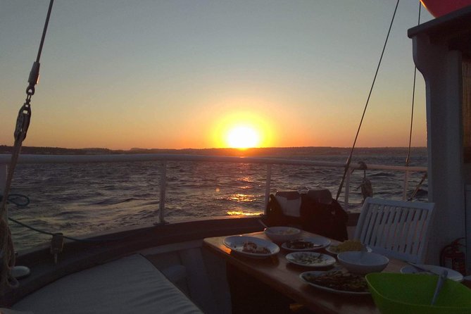 Sunset Cruise With a Swimming Stop at Kalithea Bay - Booking Information and Pricing