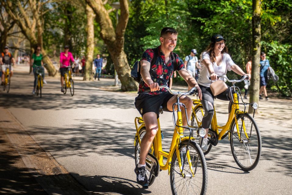 Amsterdam: Highlights and Hidden Gems Bike Tour - Historical Insights and Local Districts