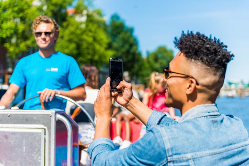 Amsterdam: Open Boat Canal Cruise With Local Guide - Full Description of Canal Cruise